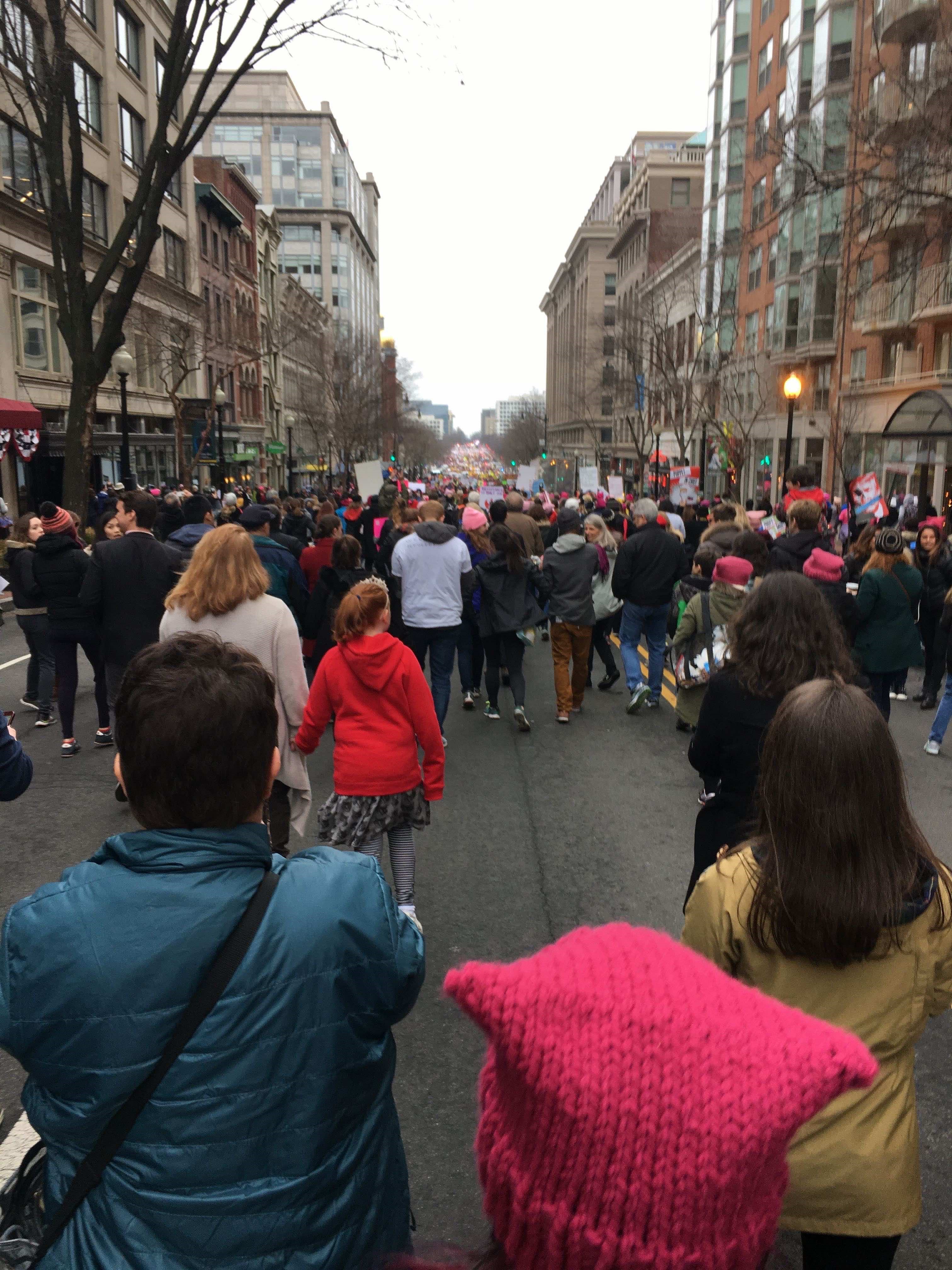 Women's Walk on Washington Crowded Street